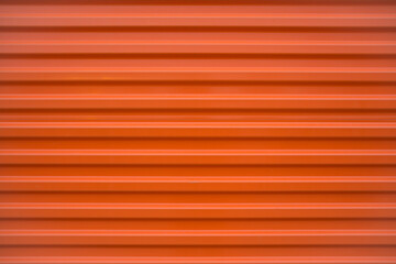 Obraz premium Bright and Vibrant Orange Grooved Pattern Texture Background