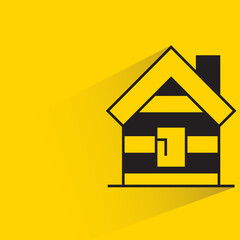 hut with shadow on yellow background