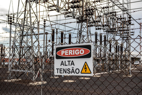 electric power distribution station with "Danger High-Voltage" sign  in Brazil