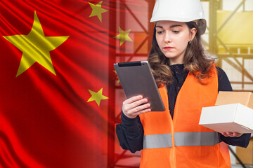 Business with China. Warehouse worker next to flag of PRC. Delivery of goods from China. Young girl...
