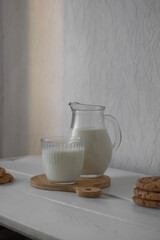 Kefir, fermented milk, on a white table