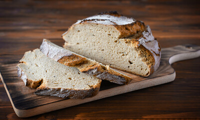 freshly baked bread on dark gray kitchen table