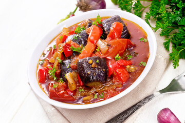 Ragout vegetable with eggplant on white board