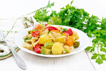 Ragout vegetable with zucchini on board