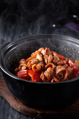 Delicious Chinese food, stone pot fish sausage