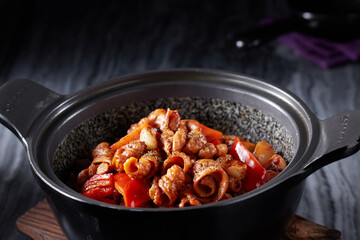 Delicious Chinese food, stone pot fish sausage