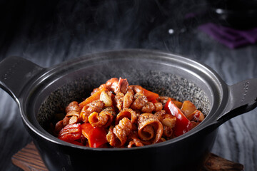 Delicious Chinese food, stone pot fish sausage
