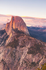 Fototapeta premium Half Dome at sunset seen from the Glacier Point Overlook in Yosemite National Park