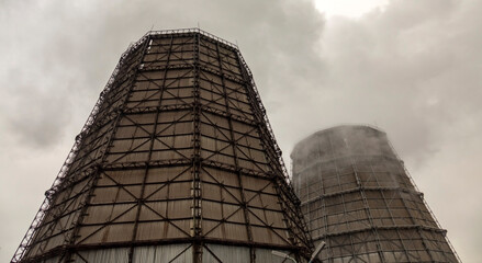 Smoke from pipes with emissions of harmful substances at an industrial metallurgical plant.