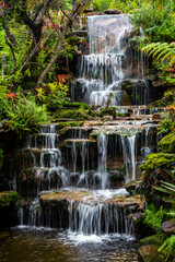 Artificial waterfall decoration in the park. © MrPreecha