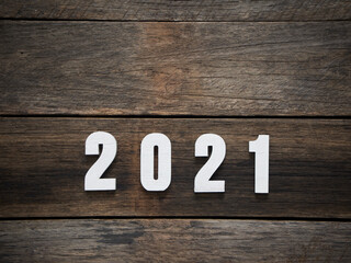 2021 year figures on wooden background