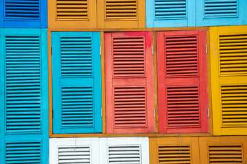 Colorful wooden windows for background.