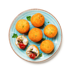 Homemade Fried Risotto Arancini stuffed with mushroom and parmesan cheese, served with tomato sauce.isolated on white background