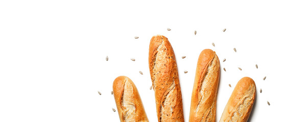 Freshly baked French baguettes isolated on white background.Top view with space for text