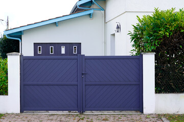 door grey steel gate aluminum portal of home suburbs house in street view