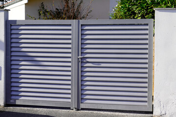 door metal portal driveway entrance gates house garage in suburb
