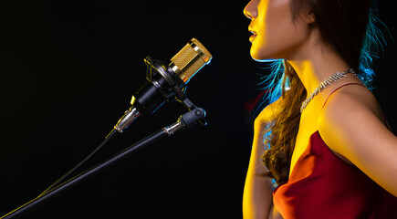 Teenager Woman sing song loudly power sound on Microphone soundproof