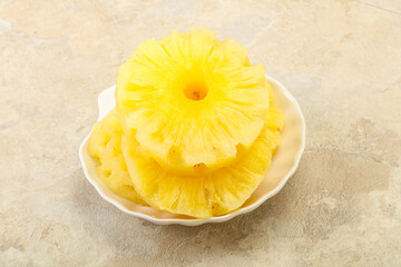 Sweet pineapple rings in the bowl