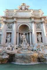 Fototapeta na wymiar Trevi fountain with the God Neptune in the center in the city of