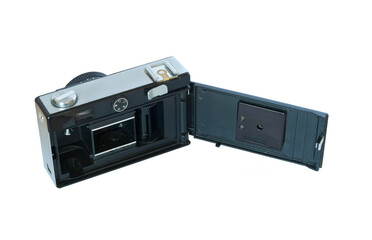 Obraz premium An old film camera with an open back cover.