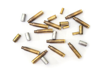 empty cases for carbine and rifle isolated on white background. Shooting ammunition, close-up.