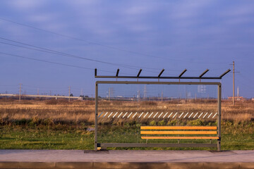 unfinished public transport stop in the field