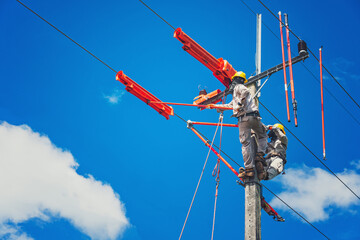 The lineman used tie stick to carve the tie wire used to wrap the electrical wires attached to the damaged high voltage insulator. In order to prepare to replace the damaged equipment