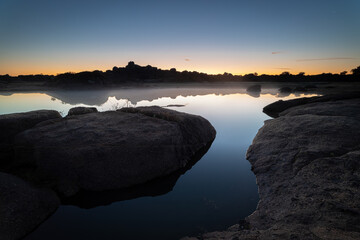 Sunrise in the natural park of Los Barruecos. Extremadura. Spain.