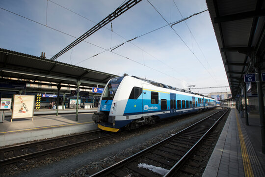 A train with Brno cathedral in the background at Brno Station, Czech Republic - 20th February 2018