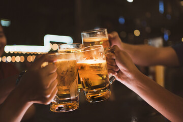 Asian friends Drinking beer outdoors at the brewery for the New Year festival