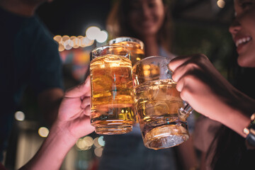 Asian friends Drinking beer outdoors at the brewery for the New Year festival