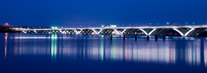 The Woodrow Wilson Memorial Bridge spans the Potomac River between Alexandria, Virginia, and the...