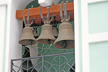 Three bells on the belfry of an Orthodox Church close-up