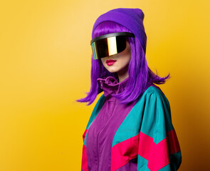 Style woman in VR glasses and 80s tracksuit