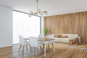Wooden white hall with chairs and wooden table with beige sofa and big window