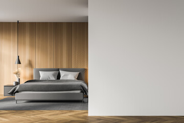 White and wooden master bedroom interior with mock up wall