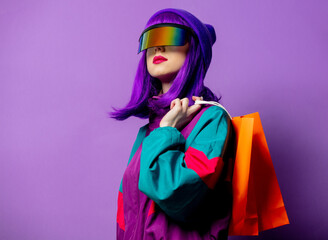 Style woman in VR glasses and 80s tracksuit with shopping bags