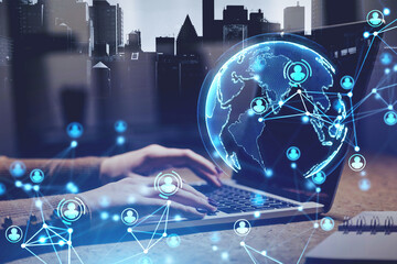 Woman with laptop, planet and HR interface