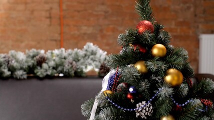 Christmas Tree with red and gold balls. Colorful holidays decoration. Christmas greeting card. Happy New Year. 