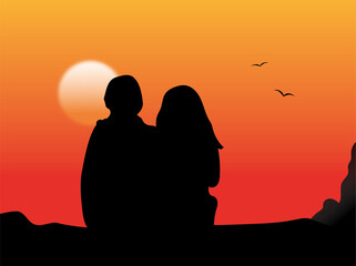 Loving couple on sunset background