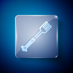 Fototapeta premium White Fork icon isolated on blue background. Cutlery symbol. Square glass panels. Vector.