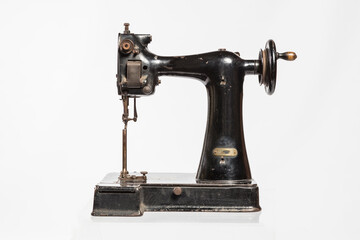 Vintage sewing machine isolated on white