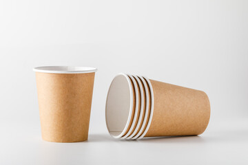 disposable paper cups isolated on white background