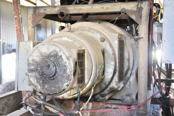 An ancient generator for using in the gas station when a power cut, which is still working today,...