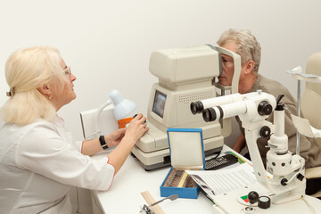 Doctor and patient in ophthalmology clinic