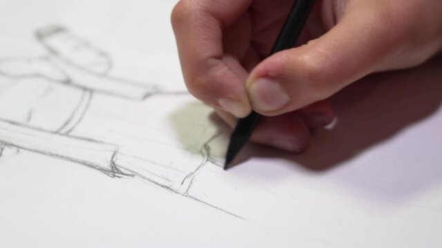 Hand painting with pencil on white paper