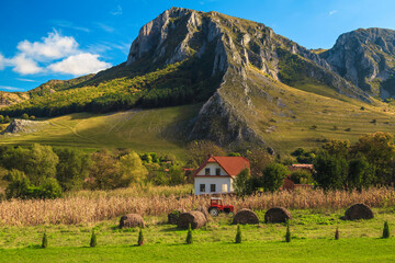 Farmland and old tractor in Rimetea village, Transylvania, Romania