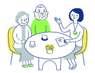 接客　相談するシニア夫婦と説明する女性スタッフ