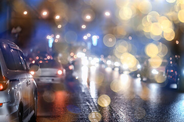 abstract blurred view of the night city from a car window, traffic in the city