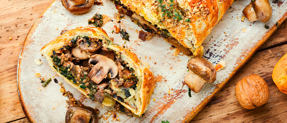 Sliced pie with mushrooms